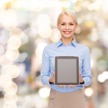 business, technology, internet and advertisement concept - smiling businesswoman with blank black tablet pc computer screen