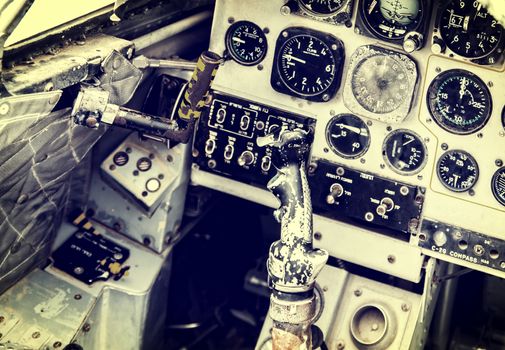 Old device in the pilot cockpit. Photo in old color image style.