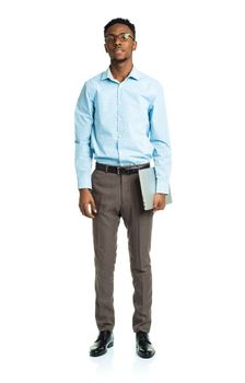 African american college student with laptop standing on white background