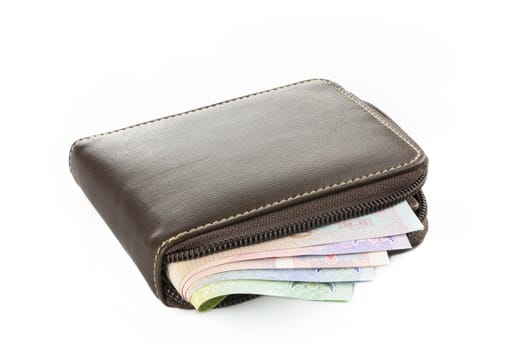 Wallet with THAI BAHT money isolated on white background
