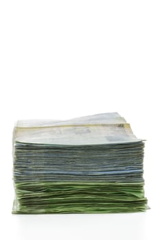 Thailand money 20 and 50 baht banknotes stacked isolated
