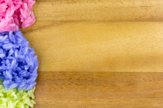 colorful sticky rice steamed with coconut milk in plastic plate