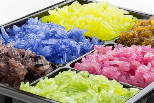 colorful sticky rice steamed with coconut milk in plastic plate