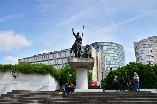 Brussels, Belgium - May 12, 2015: People at Don Quixote &amp; Sancho Panza Statue in Place d'Espagne (Spanish Sqaure), Brussels, Belgium. on May 12, 2015.