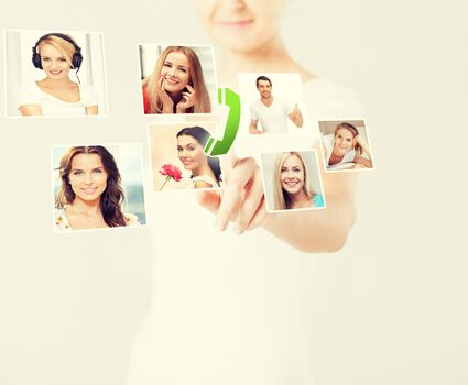 technology and communication - woman pressing button on virtual screen with contact icons