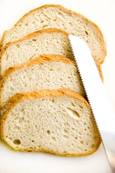 Bread conceptual image. Approximation of bread and knife.