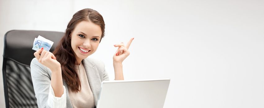 online banking concept - picture of happy woman with laptop computer and euro cash money