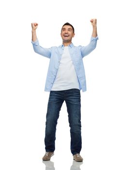 happiness, gesture and people concept - happy laughing man with raised hands