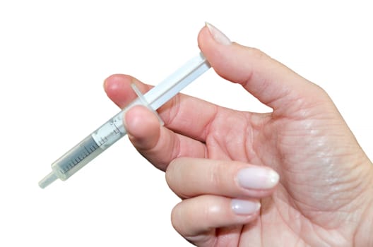 Human hand with syringe on white background.