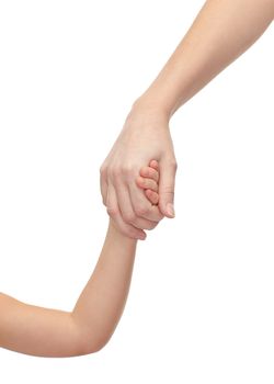 people, charity, family and adoption concept - close up of woman and little girl holding hands