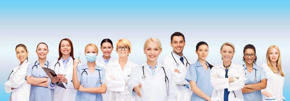 healthcare and medicine concept - smiling doctors and nurses with stethoscope