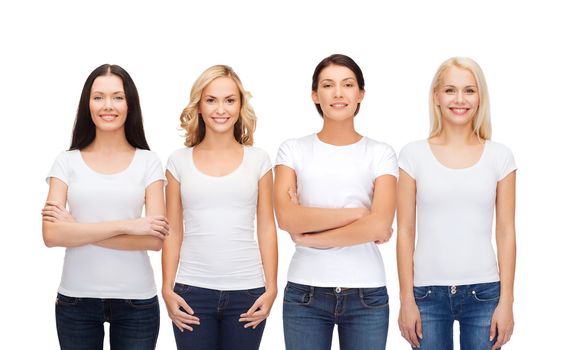 clothing design and people unity concept - group of happy smiling women in blank white t-shirts and jeans