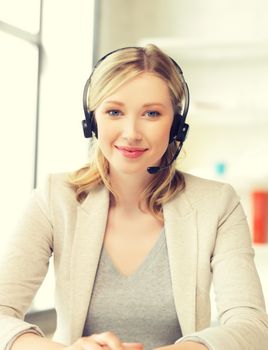 picture of friendly female helpline operator with headphones