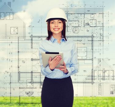 building, developing, consrtuction and architecture concept - friendly young smiling businesswoman in white helmet