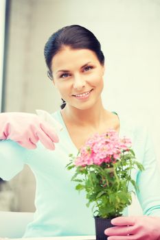 bright picture of lovely housewife with flower.