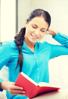 bright picture of happy and smiling woman with book..