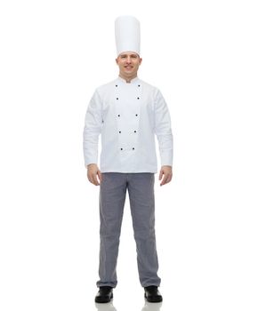cooking, profession and people concept - happy male chef cook