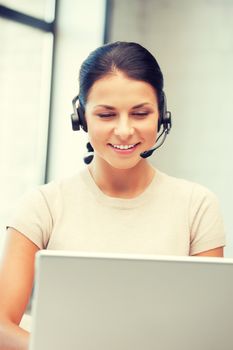 picture of helpline operator with laptop computer.