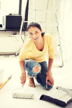 bright picture of lovely housewife painting at home