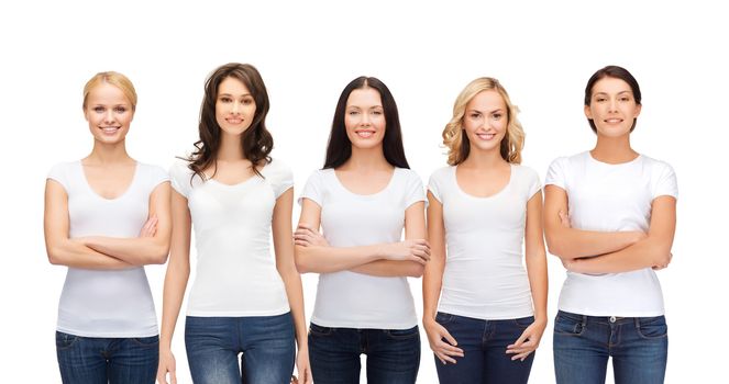 clothing design and people unity concept - group of happy smiling women in blank white t-shirts and jeans