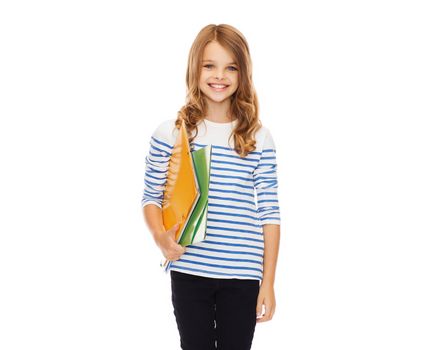 education and school concept - child holding colorful folders