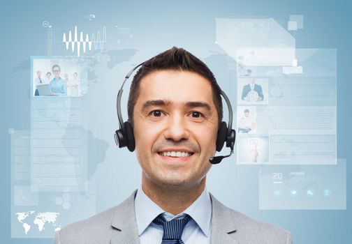 business, people, technology and service concept - smiling businessman in headset over blue background with world map and virtual screens