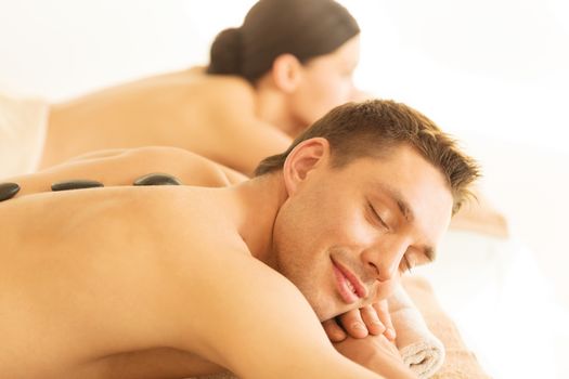 picture of couple in spa salon with hot stones