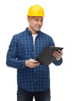 repair, building, construction and maintenance concept - smiling man or builder in helmet with clipboard