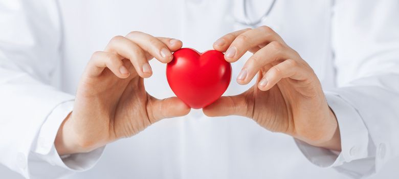 close up of man hands with heart