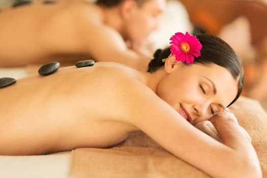 picture of couple in spa salon with hot stones