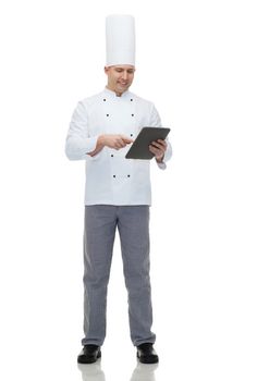 cooking, profession and people concept - happy male chef cook holding tablet pc computer
