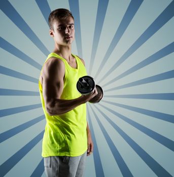 sport, fitness, weightlifting, bodybuilding and people concept - young man with dumbbell flexing biceps over blue burst rays background