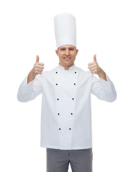 cooking, profession, gesture and people concept - happy male chef cook showing thumbs up