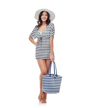 people, fashion, summer and beach concept - happy young woman in bikini swimsuit and sun hat