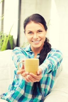 bright picture of lovely housewife with mug