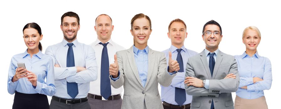 business, people, corporate, teamwork and office concept - group of happy businesspeople showing thumbs up