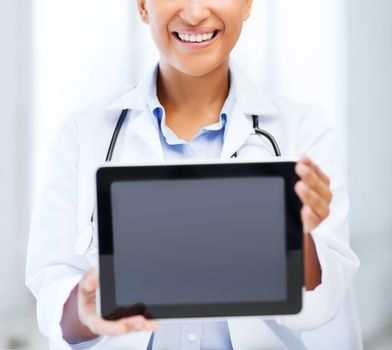 healthcare, medical and technology concept - african female doctor with tablet pc