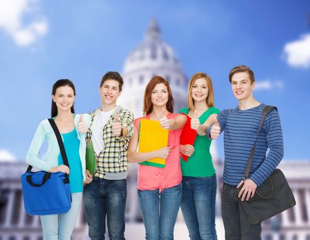 education and people concept - group of smiling students standing