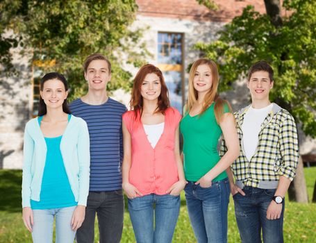 education and people concept - group of smiling students standing