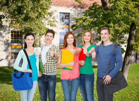 education and people concept - group of smiling students standing