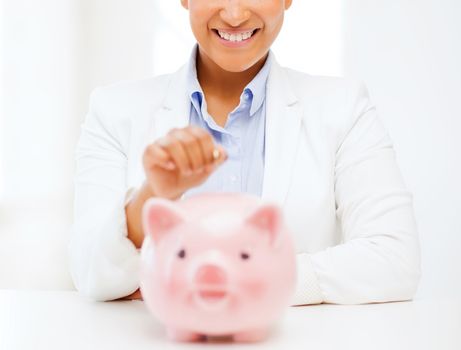 banking and finances concept - picture of lovely woman with piggy bank and cash money