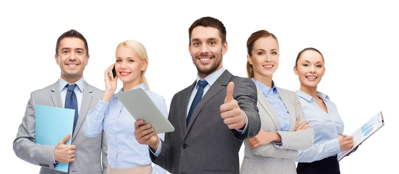business, people, gesture and office concept - group of smiling businessmen showing thumbs up