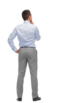 business, people, dilemma, rear view and office concept - businessman thinking from back
