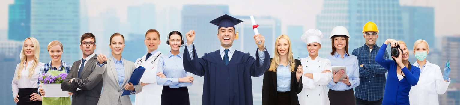 people, profession, education and success concept - happy bachelor with diploma over different workers over city background