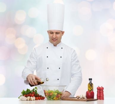 profession, vegetarian, food and people concept - happy male chef cooking salad over blue lights background