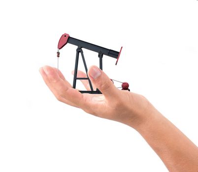 hand hold pumpjack isolated on white background