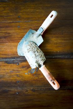 shovel on wood background