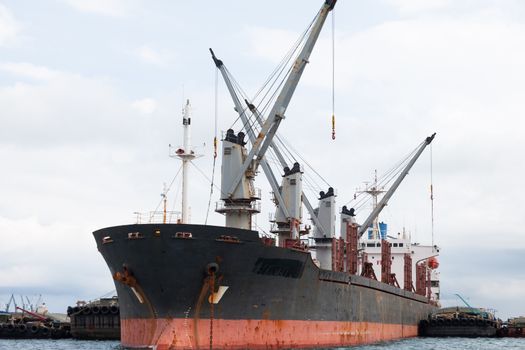 Cargo ship. Parking in the sea to await transportation to the port.