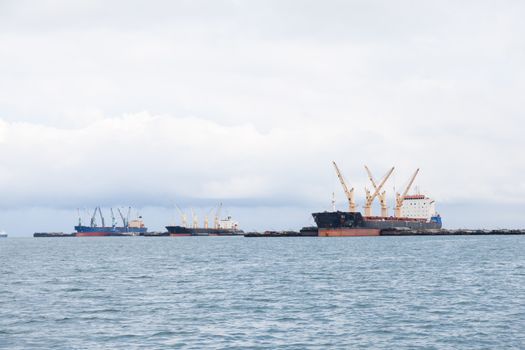 Cargo ship. Parking in the sea to await transportation to the port.