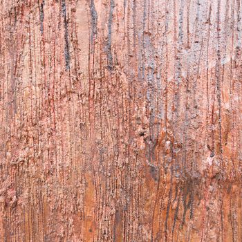 Background cement. Scroll pattern made of wood and painted to look like wood.